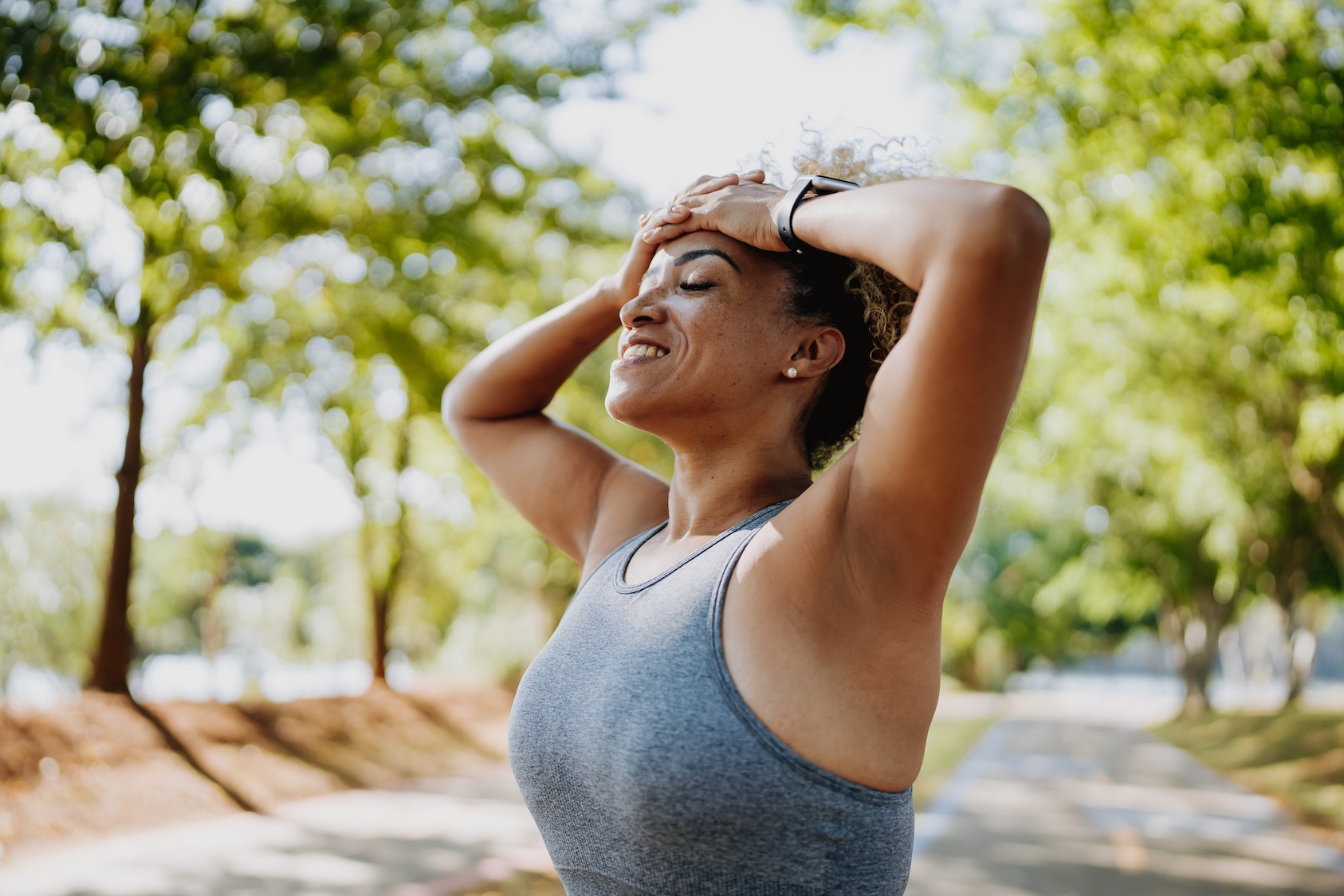 Woman with smartwatch after exercise